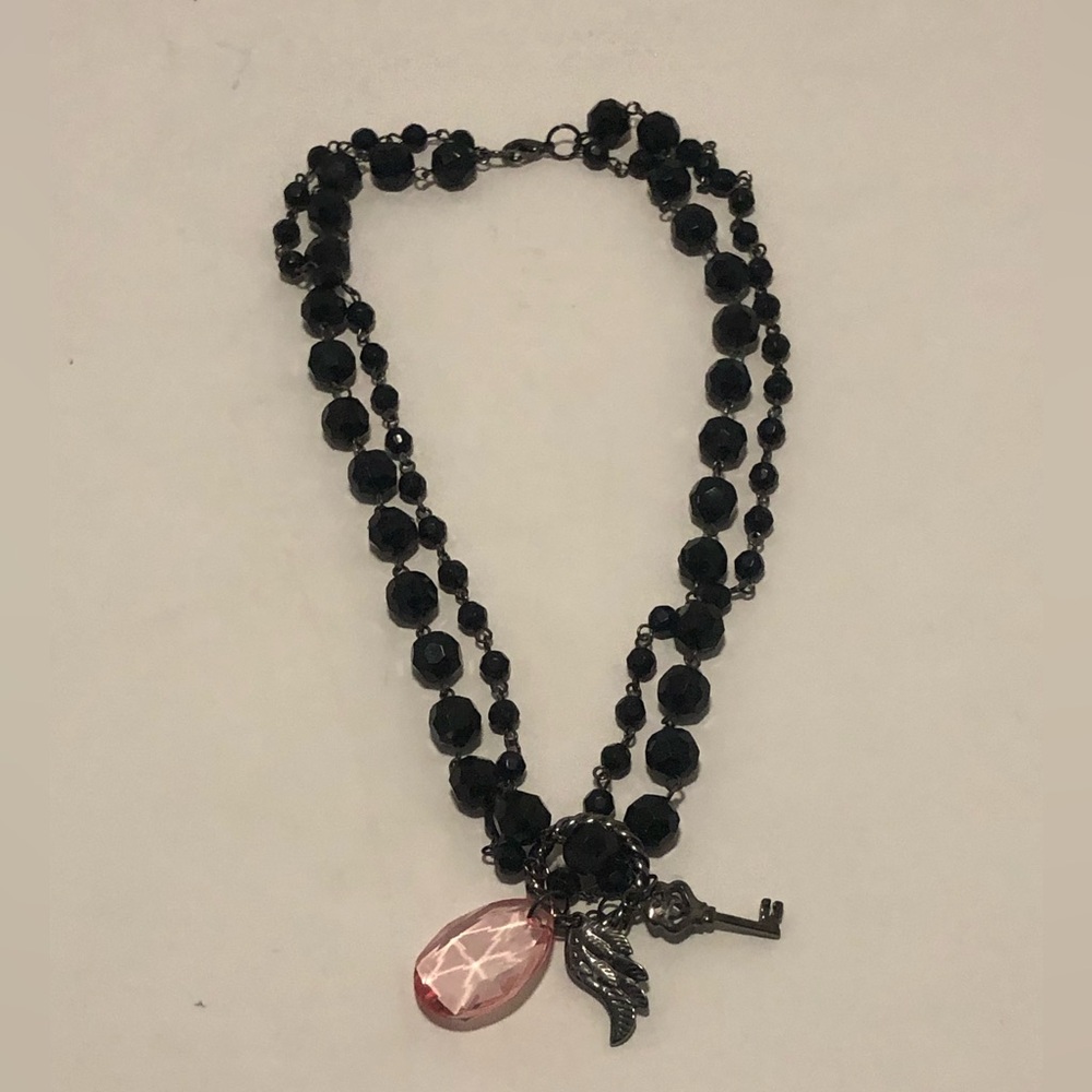 Elegant Black Beaded Necklace with Charms